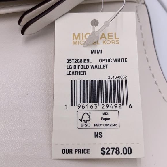 Brand New with Tag
Michael Kors Large Mimi Bifold Wallet
Color: Optic White - Picture 11 of 16